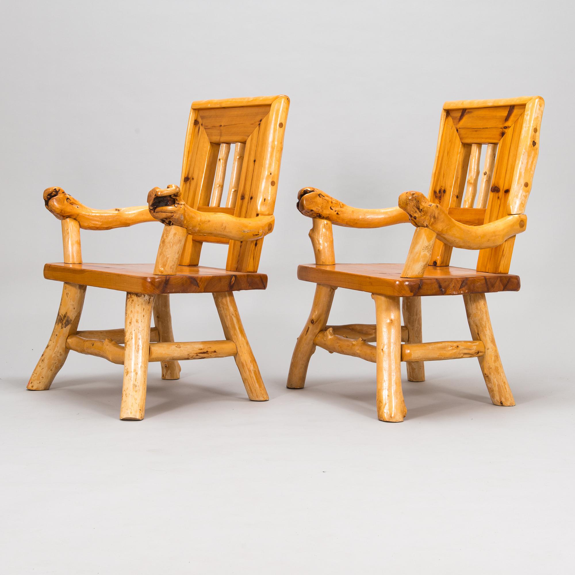 A pair of mid-20th-century armchairs made by Tauno Saarela Kuusamo Finland.