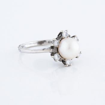 A cultured pearl and brilliant cut diamond ring.