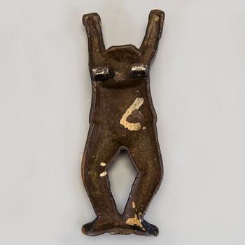 A cast iron boot jack by Bolinder, Stockholm, around 1900.