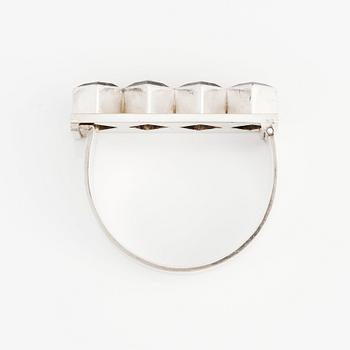 Sigurd Persson, a sterling silver, part gilt bangle with smoky qvartz (citrine), Stockholm 1963, executed by silversmith Peter Schmitt.