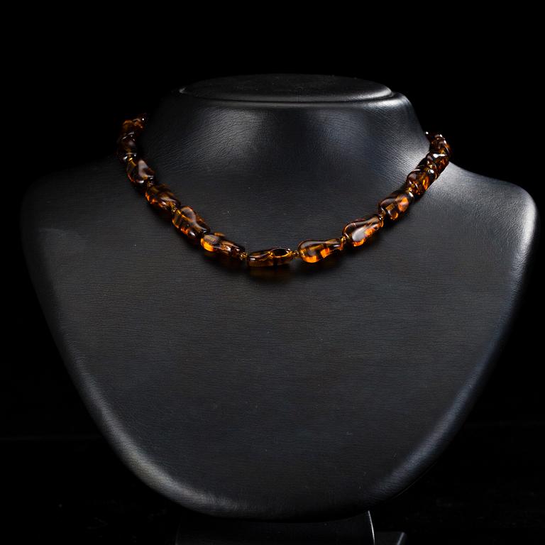 HALSSMYCKEN, 4 st, bärnsten, pärlor i olika storlekar.