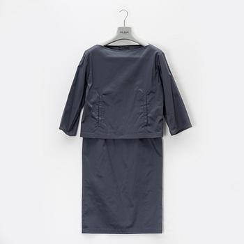 Prada, A dark grey silk-mix skirt and top.
