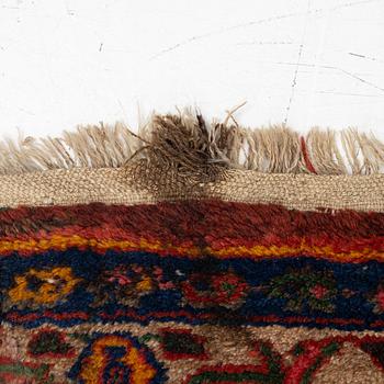 A semi-antique Northwest Persian runner, c. 388 x 94 cm.