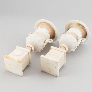 A pair of 20th century alabaster vases.