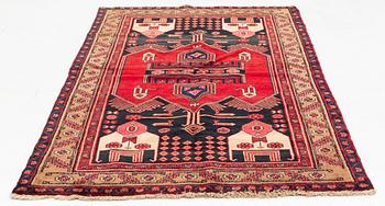 A west persian rug, ca 244 x 141 cm.