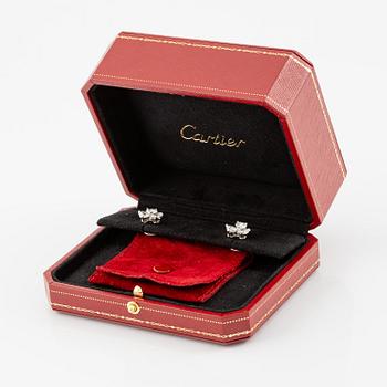 A pair of Cartier earrings in 18K white gold with six heart-shaped brilliant-cut diamonds.