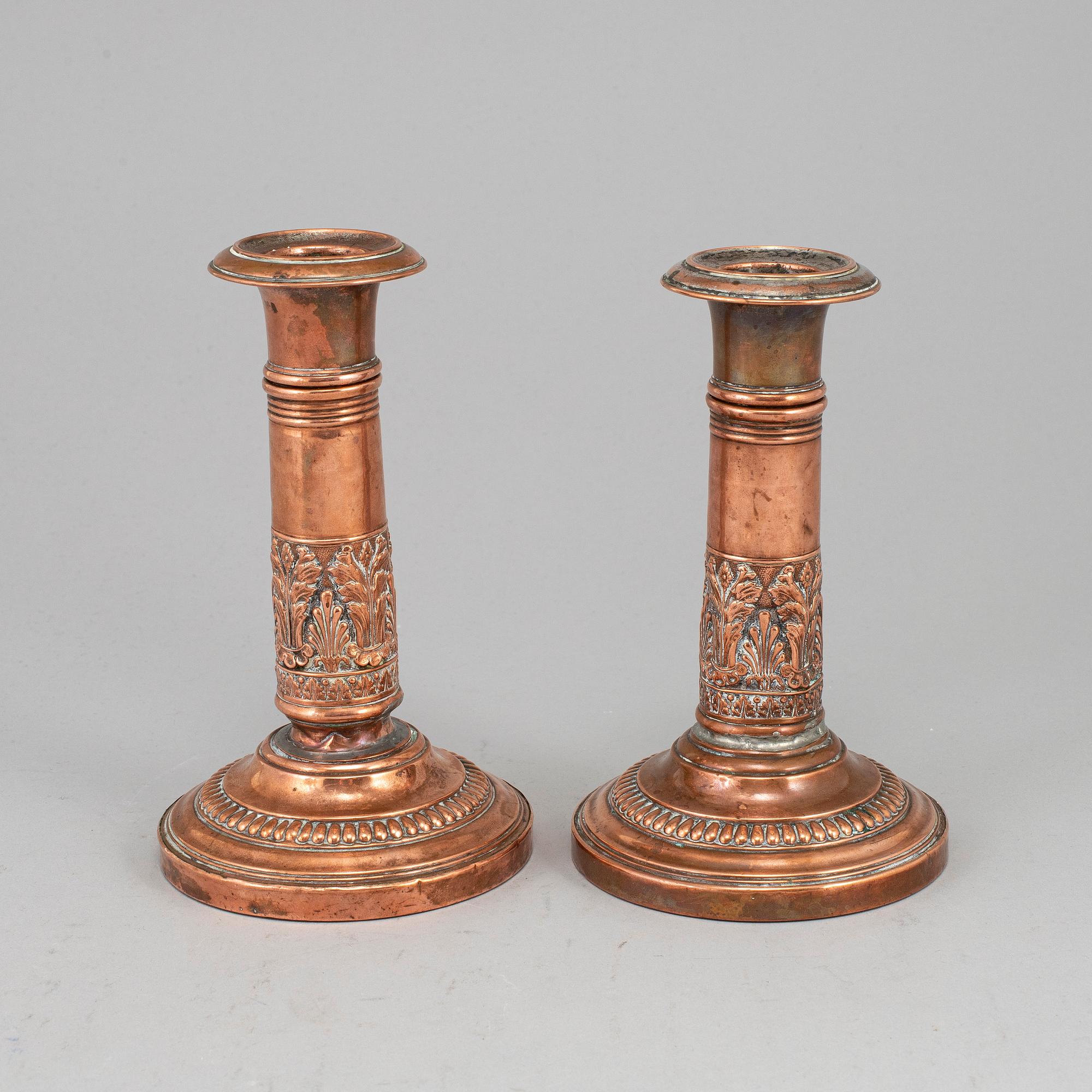 A pair of English early 19th century candlesticks.