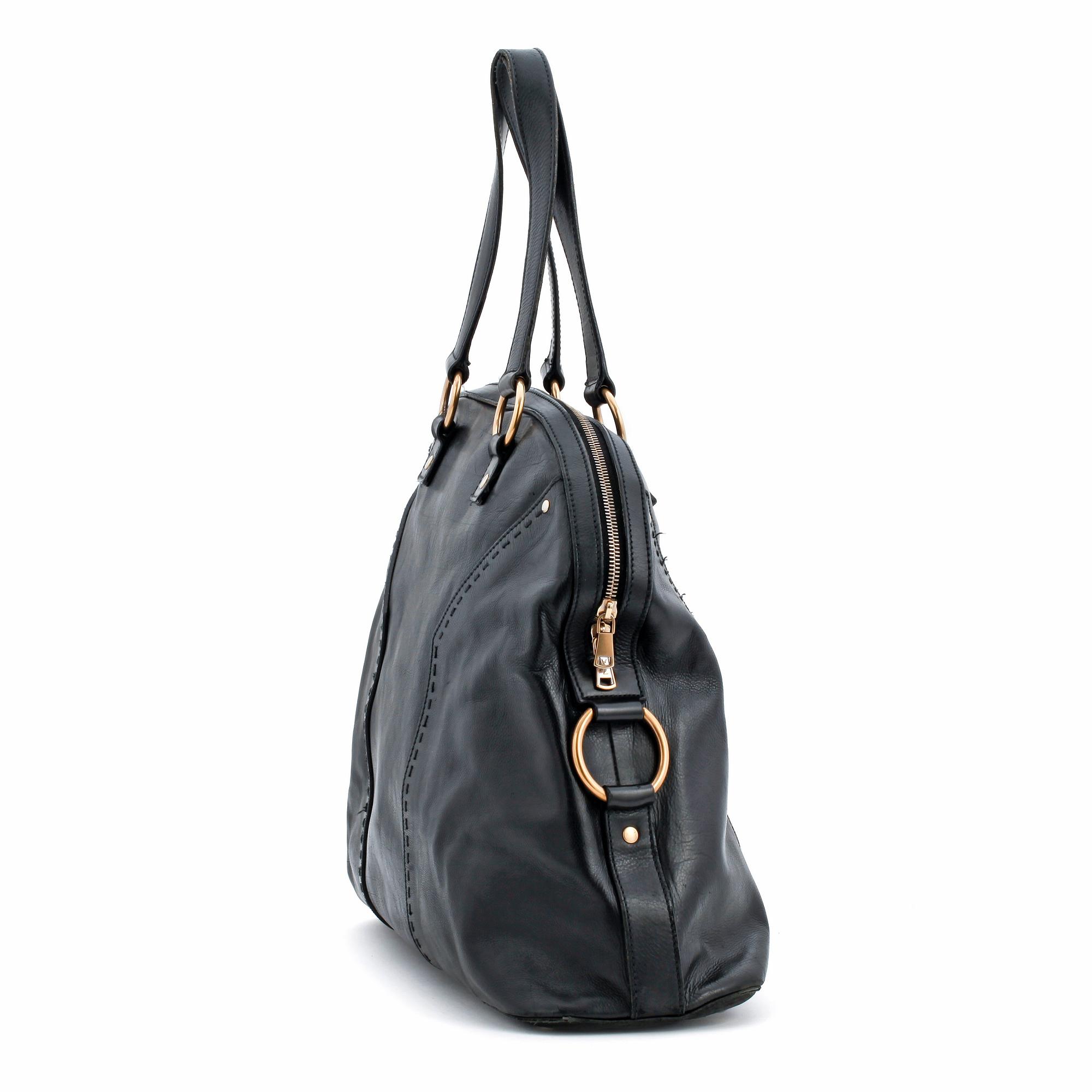 YVES SAINT LAURENT, a black leather shoulder bag, "Muse".