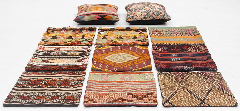 Nine Kilim pillow cases and two Kilim pillows, around 1970, ca. 50 x 50 cm.