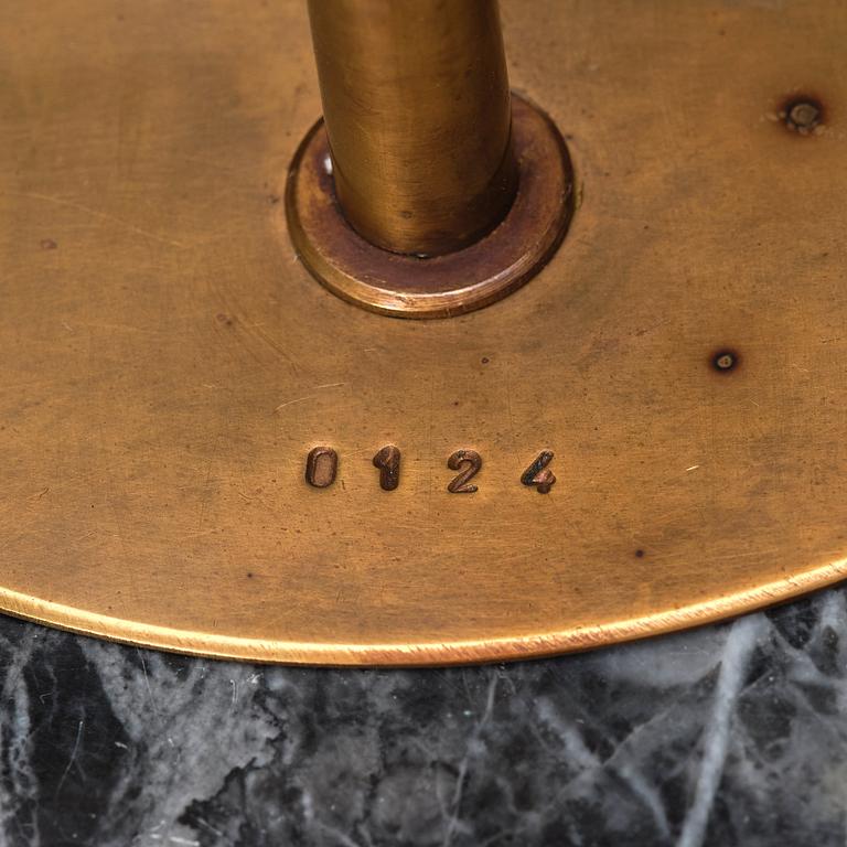 An Austrian brass and black marble table lamp, marked Vienna 1928.