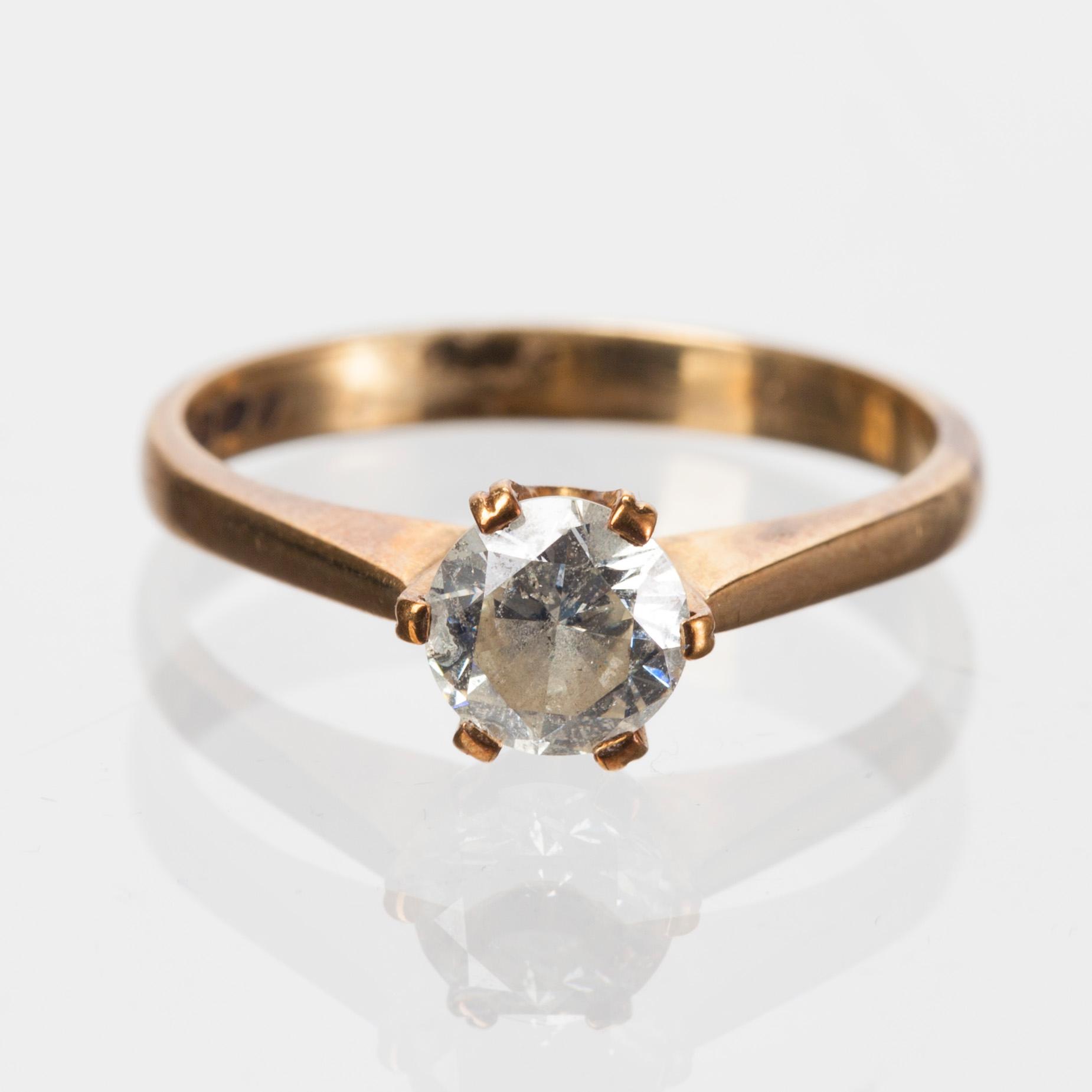 RING, guld 14K, briljantslipad diamant ca 0,80 ct. Helsingfors 1992.