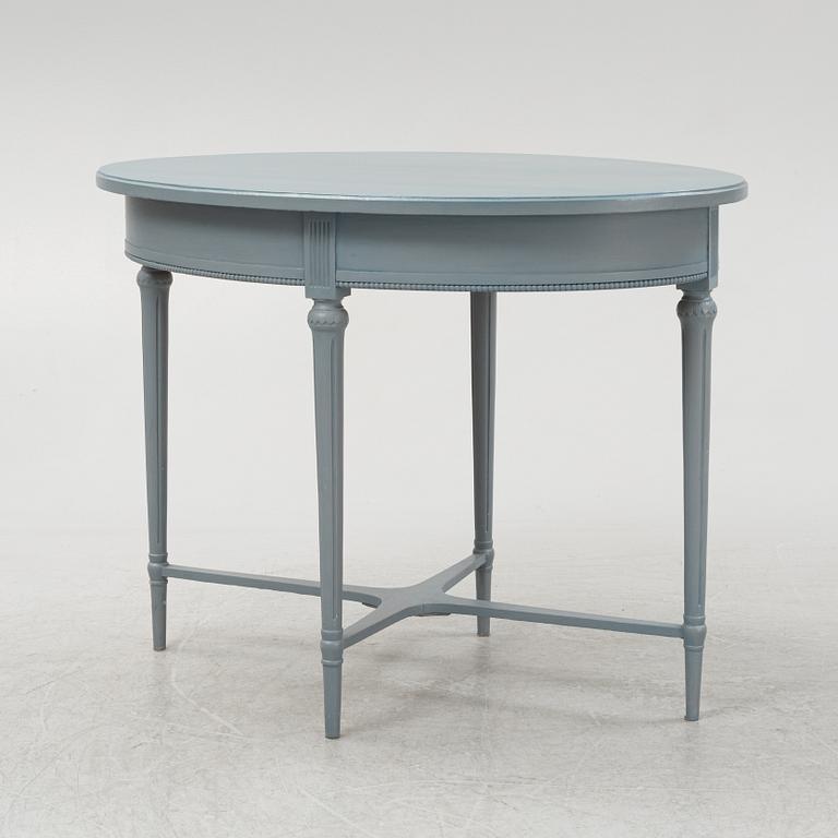 A painted sofa, table, a pair of chairs, a pair of armchairs, a pair of stools, Gustavian style, 20th Century.