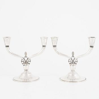 Candelabras, a pair, silver, Just Andersen, Swedish import marks, first half of the 20th century.