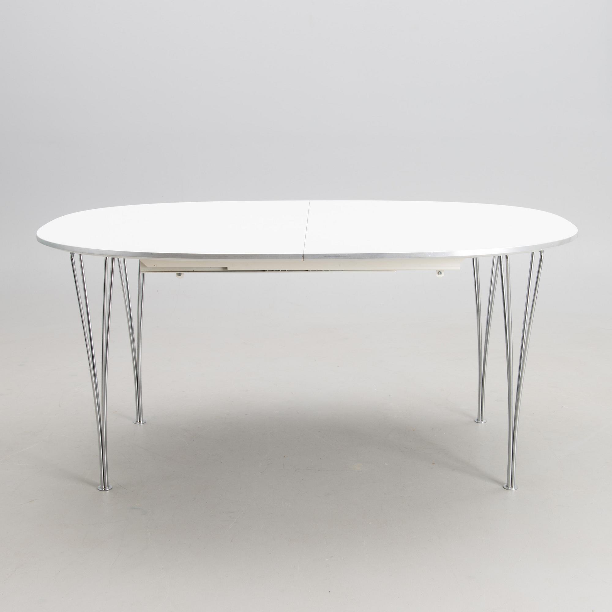 BRUNO MATHSSON AND PIET HEIN, a 'Superellips' dining table from Fritz Hansen, 1993.