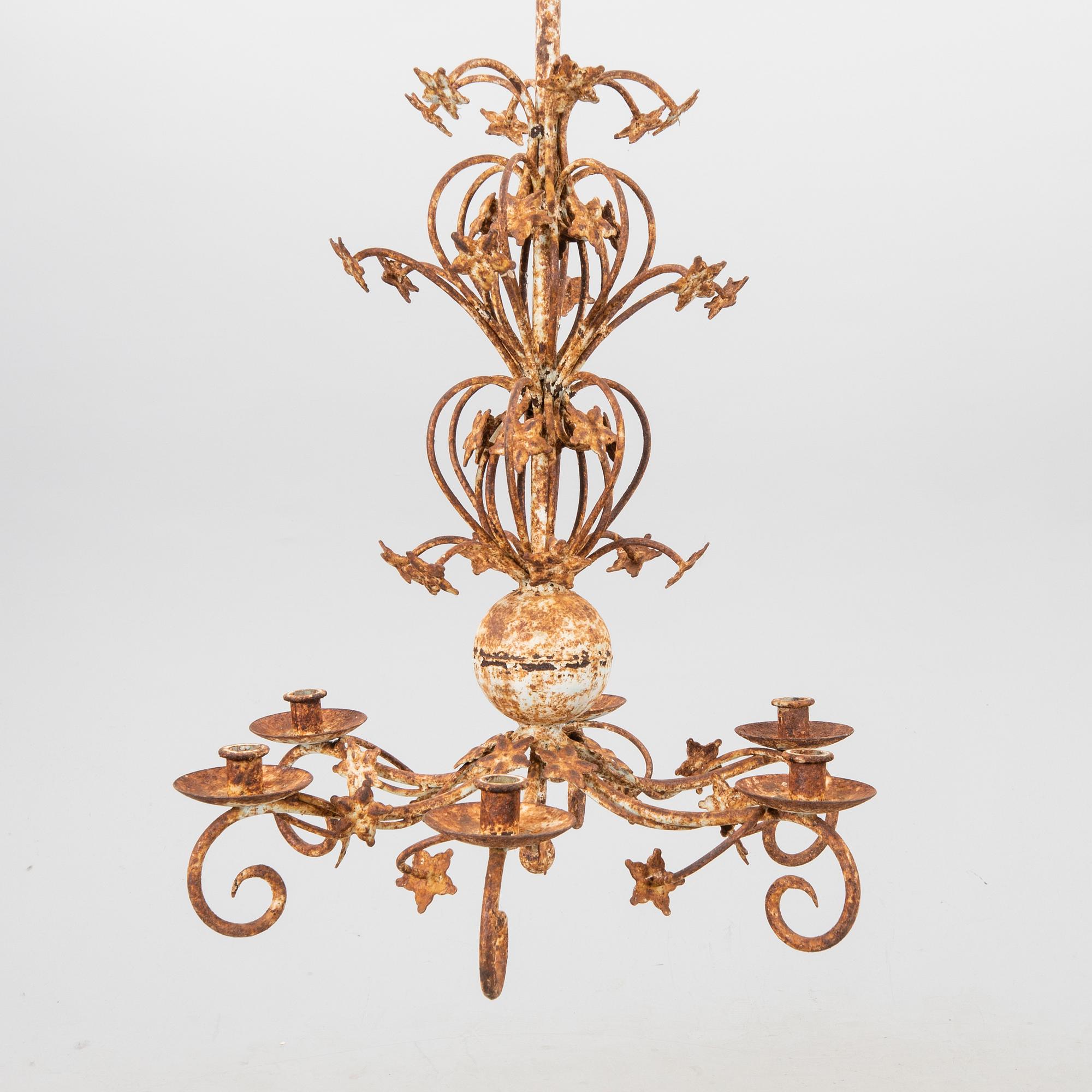 A metal ceiling pendant around 1900.