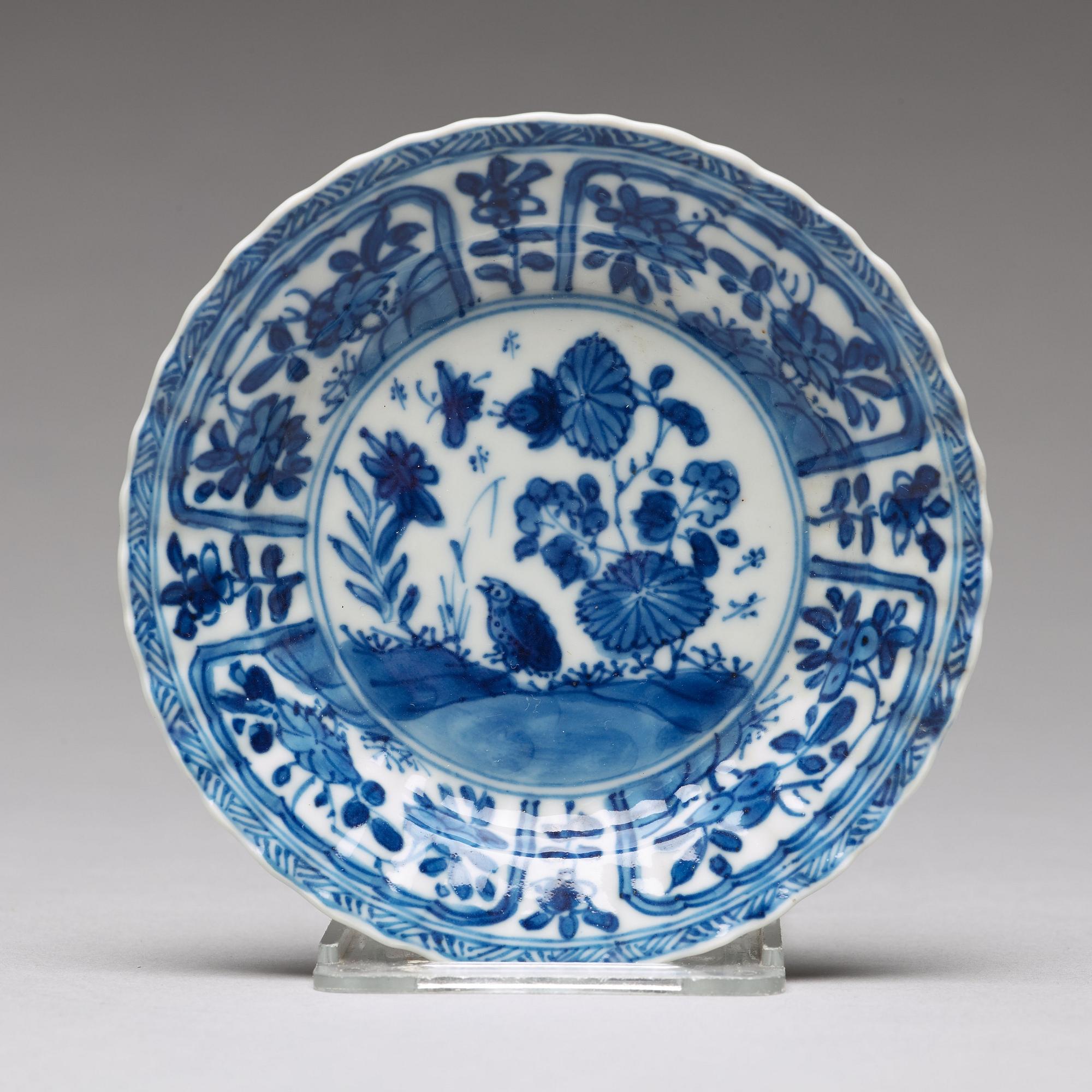 Seven matched blue and white cups with four dishes, Qing dynasty, Kangxi (1662-1722).