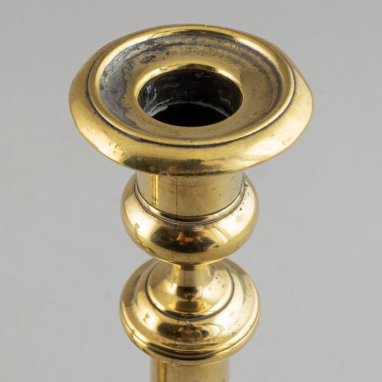 A pair of bronze Rmpire candlesticks, first half of he 19th century.