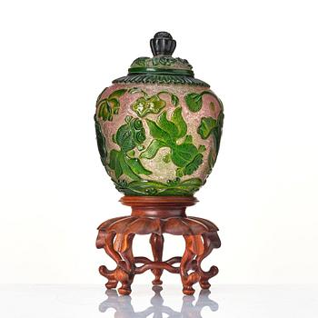 A peking glass jar with cover, Qing dynasty, with Qianlongs four character mark.