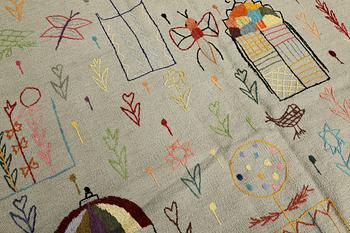 A hand-embroidered Kilim rug, approx. 241 x 183 cm.