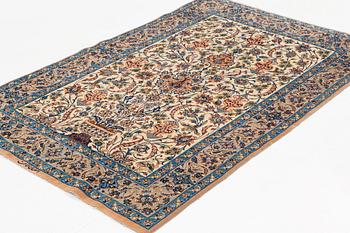 A rug, semi-antique, Esfahan, signed Ghena, ca 166 x 109 cm.