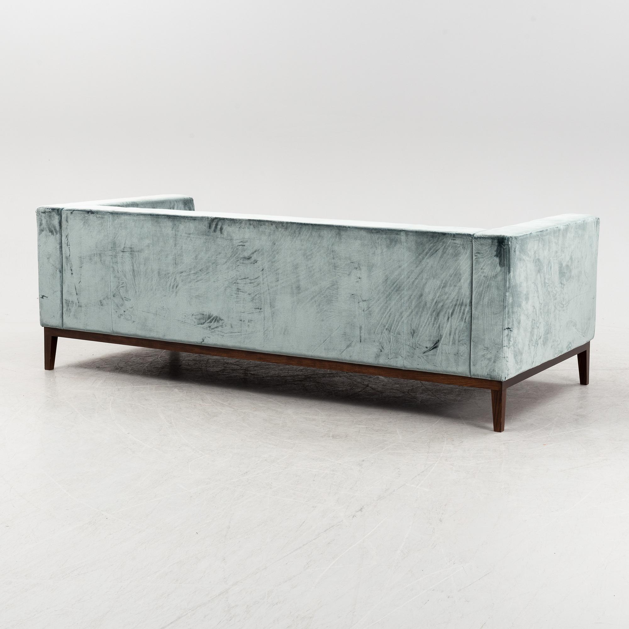 A contemporary velvet sofa, Jio Möbler.