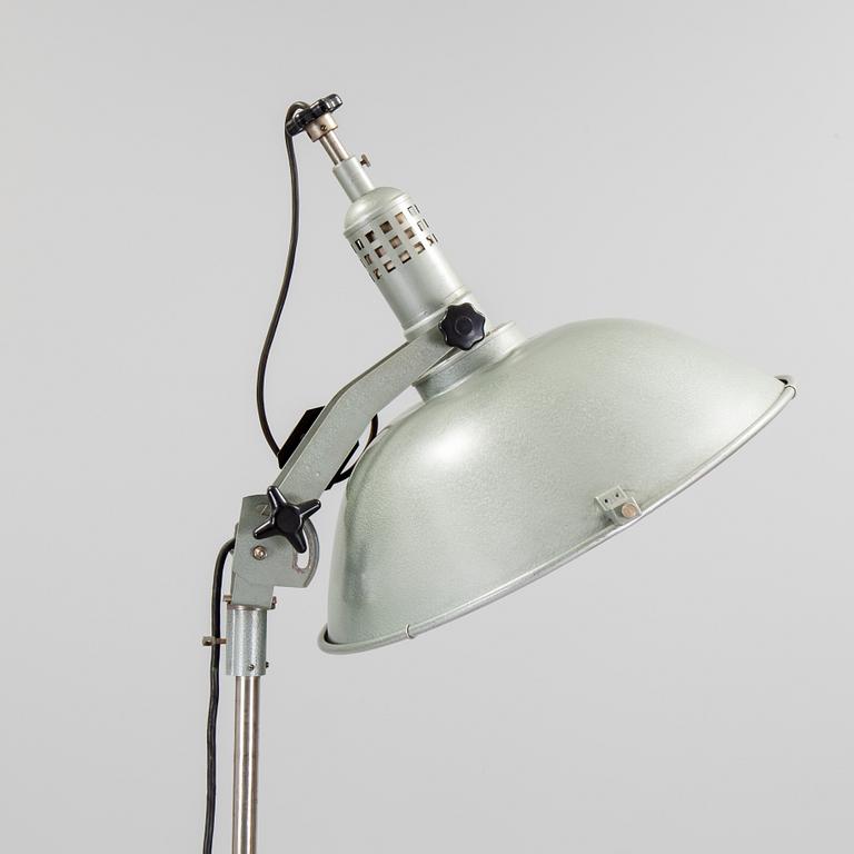 A German metal floor light from the mid 20th century.