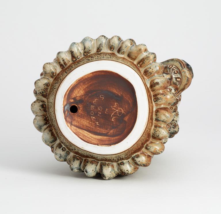 A Gunnar Nylund stoneware figure of a lion's head, Rörstrand.