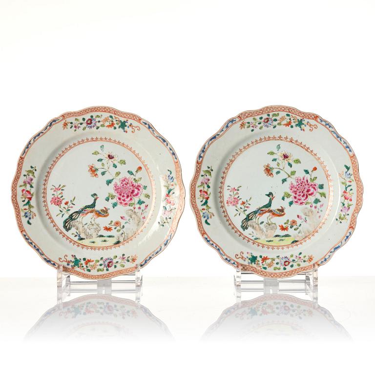 A set of six famille rose 'double peacock' dishes, Qing dynasty, Qianlong (1736-95).
