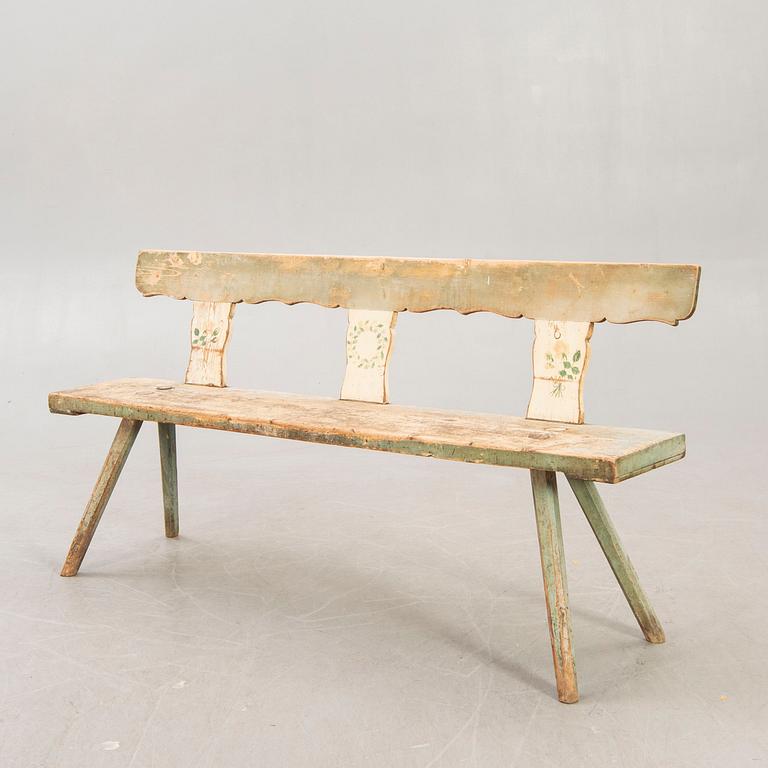 A painted early 1900s bench.