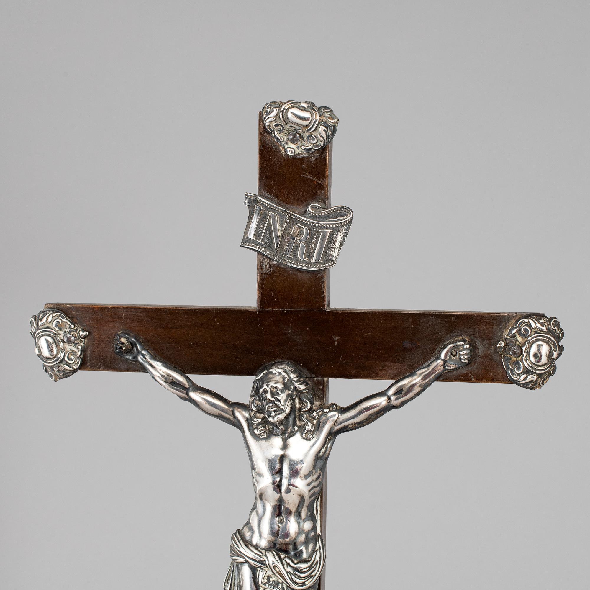 An 18th century silver and wood crucifix.