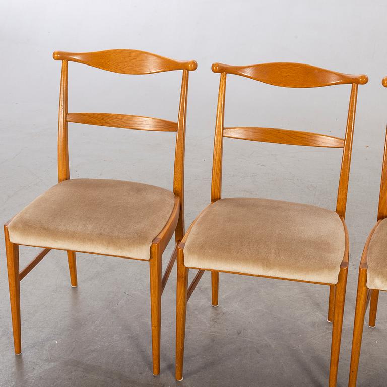 A set of four 1960:s oak chairs.