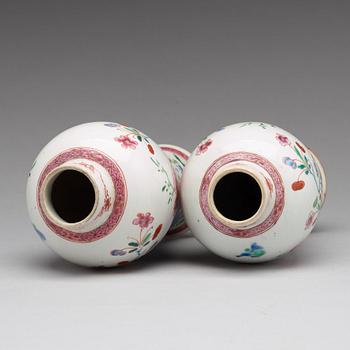 A pair of famille rose vases, Qing dynasty, Qianlong (1736-95).