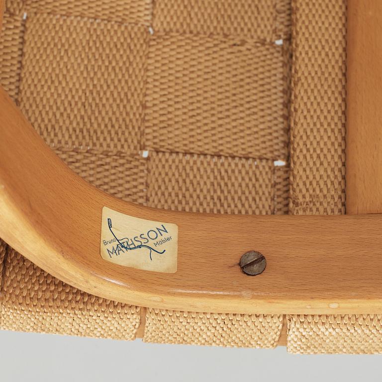 A Bruno Mathsson Swedish Modern chair with attached reading table, Karl Mathsson, Värnamo 1944.