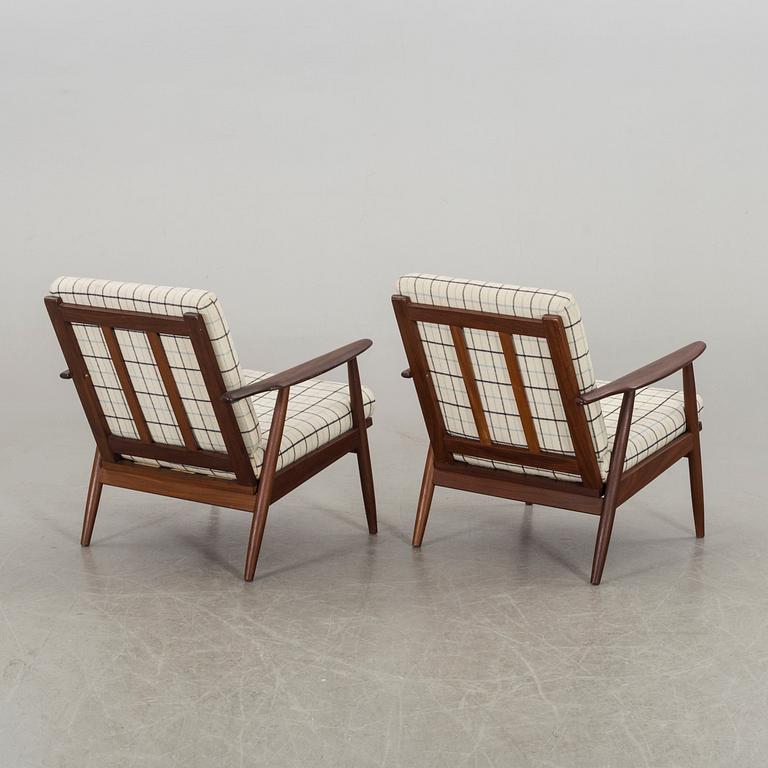 A pair of second half of the 20th century armchairs.