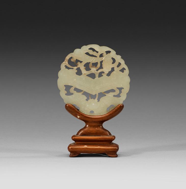 A Chinese nephrite plaque, 20th century.