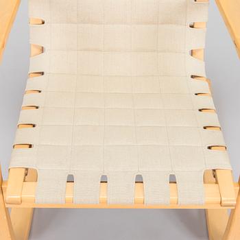 Alvar Aalto, a 1980s Artek 406 armchair.