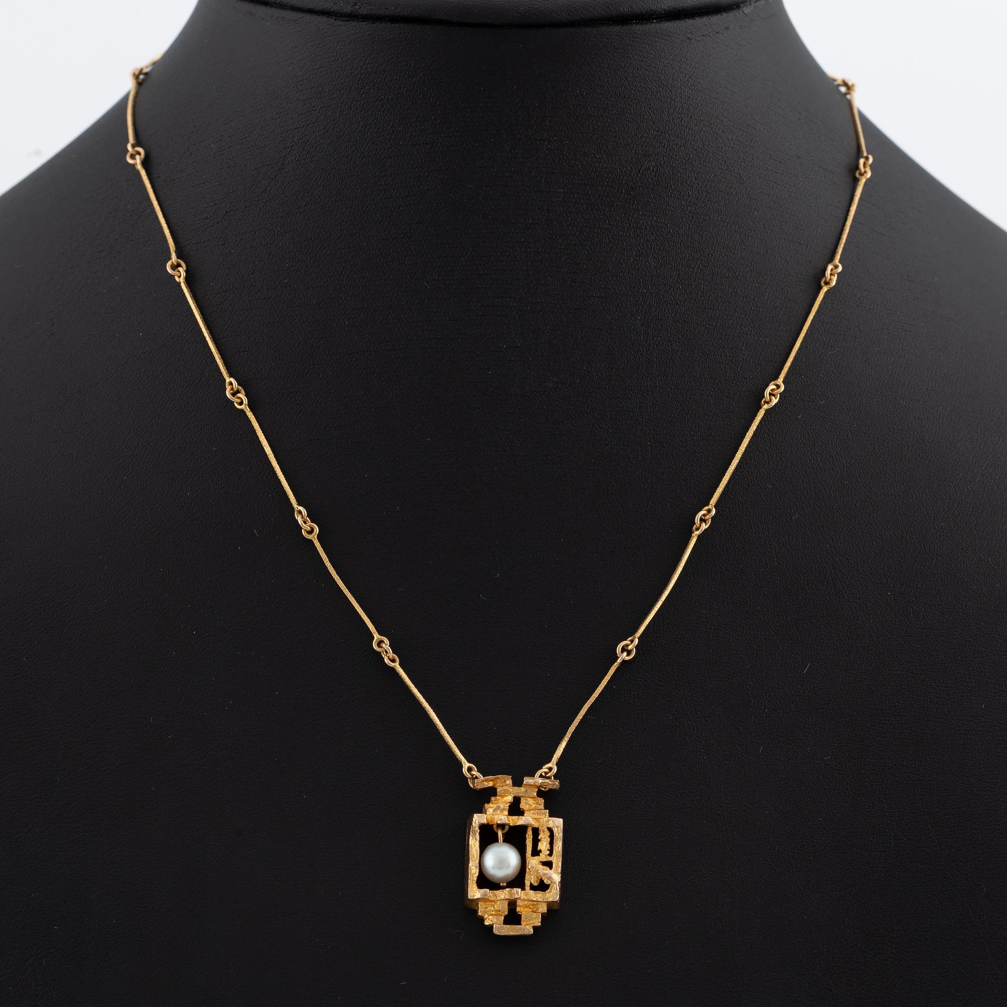 Lapponia, 14K gold necklace with a cultured pearl, designed by Björn Weckström "Magical Pearl".