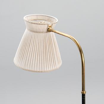 A 1950s model 2063 floor light manufactured by Orno.