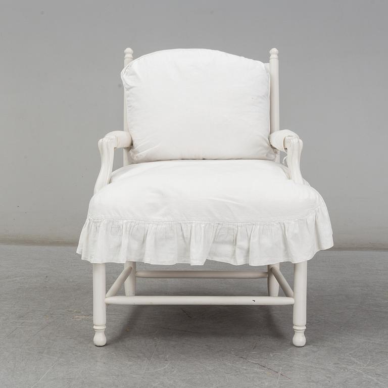 A Gustavian-style late 20th century armchair.