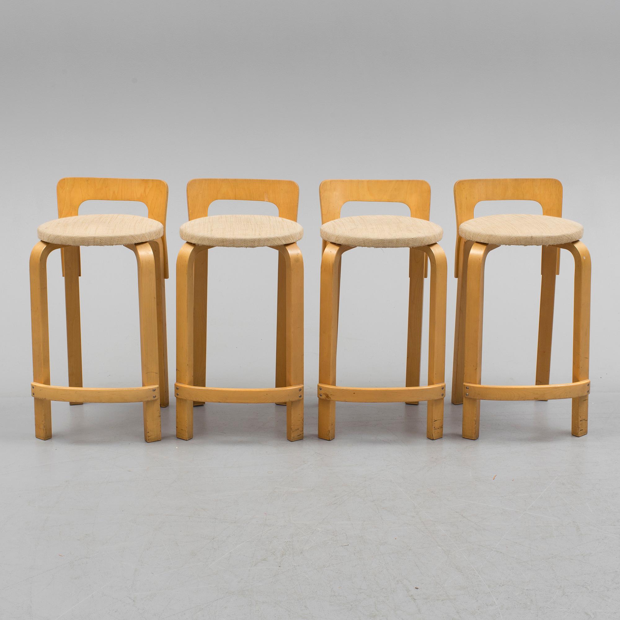 Four model K 65 bar stools by Alvar Aalto for Artek, Finland.