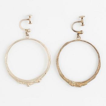 Lars Arby, a neck ring, two pendants and two pairs of earrings, silver, Gothenburg circa 1966, 1976, 1977 and 1980.