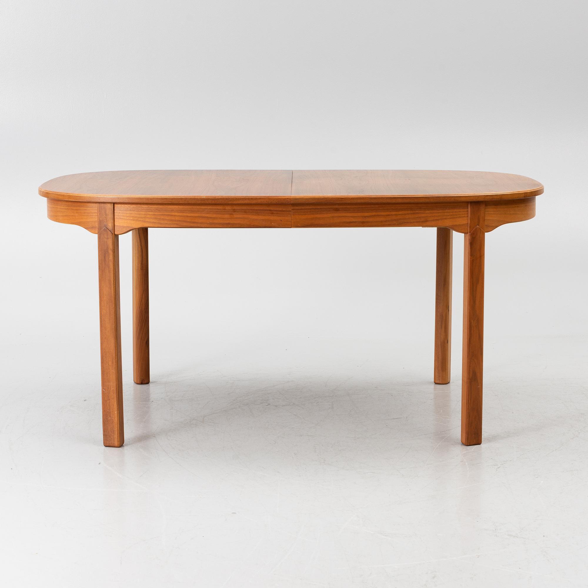 Carl Malmsten, Dining table with 2 armchairs and 6 chairs, 'Ambassador', Åfors Möbelfabrik, second half of the 20th century.