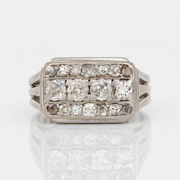 RING, 18K vitguld, med gammalslipade diamanter, tot ca 0,76 ct, Erik Thomassons, Stockholm, 1959. Total vikt ca 6,67 g.