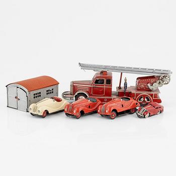 A set of five toy cars, mostly Schuco, Germany.