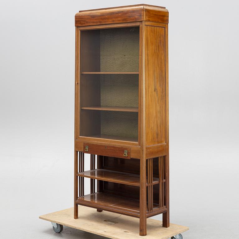 A display cabinet, early 20th Century.