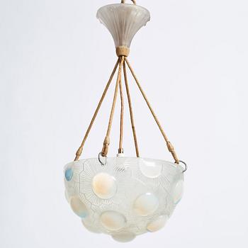 René Lalique, a 'Soleil' moulded opalescent glass ceiling light, France 1920-30s.