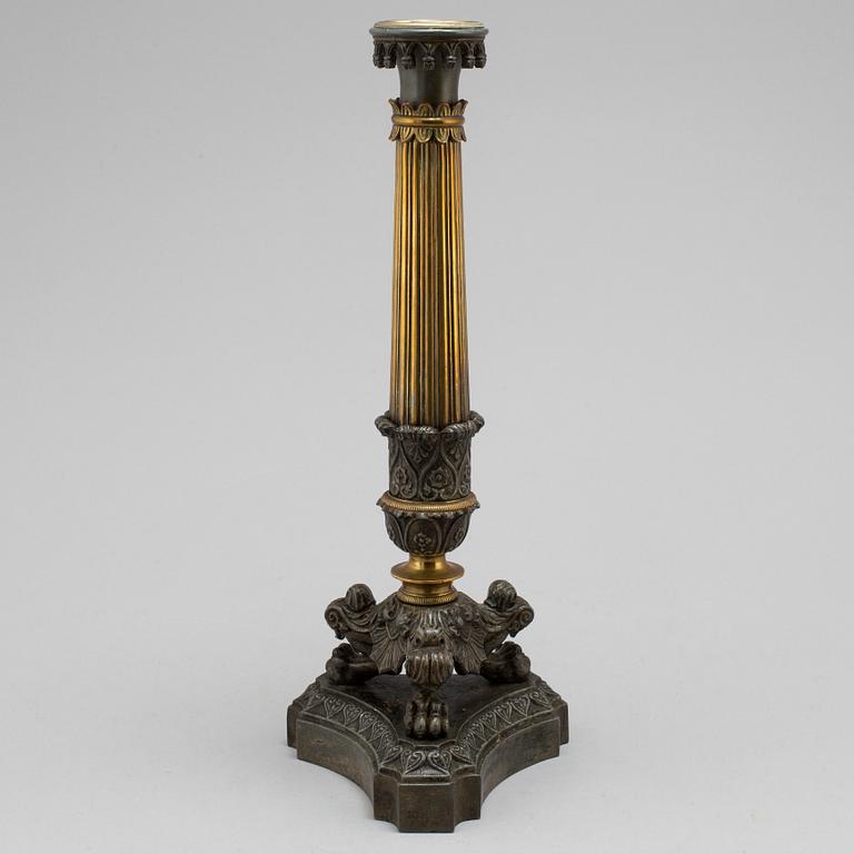 A mid 19th century late empire candlestick.