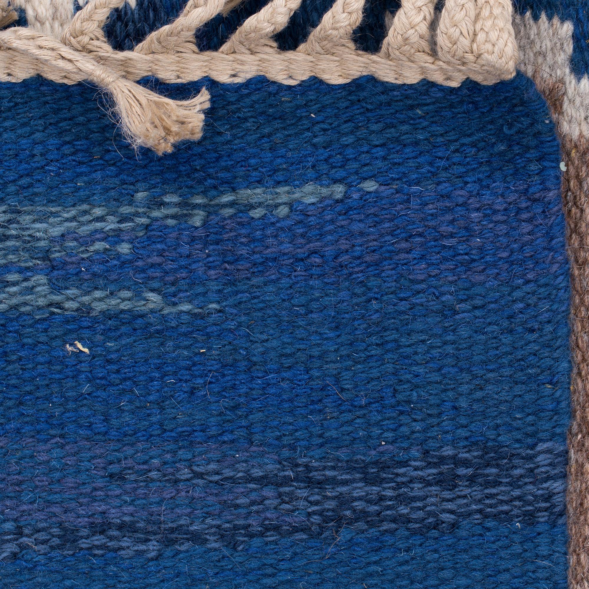 A CARPET, "Stjärnsund", flat weave, signed J (Judith Johansson), around 258 x 167 cm.