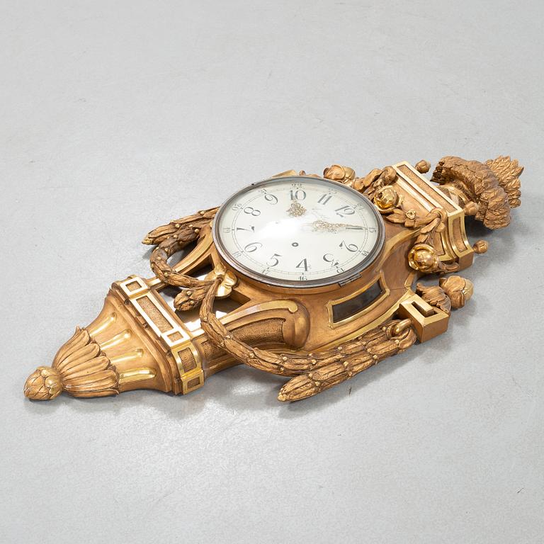 A wall clock marked Evert Lundberg Linköping from the first half of the 20th century.