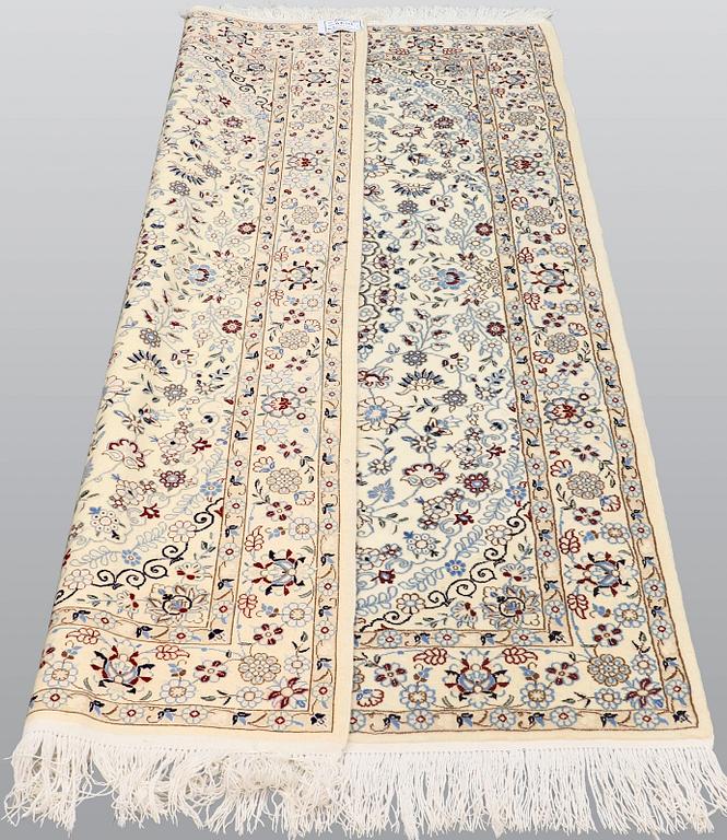 A carpet, Nain part silk s.k 9 LAA, ca 204 x 126 cm.